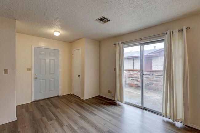 Photo - Charming 2-Bedroom Duplex with Garage & Mo...