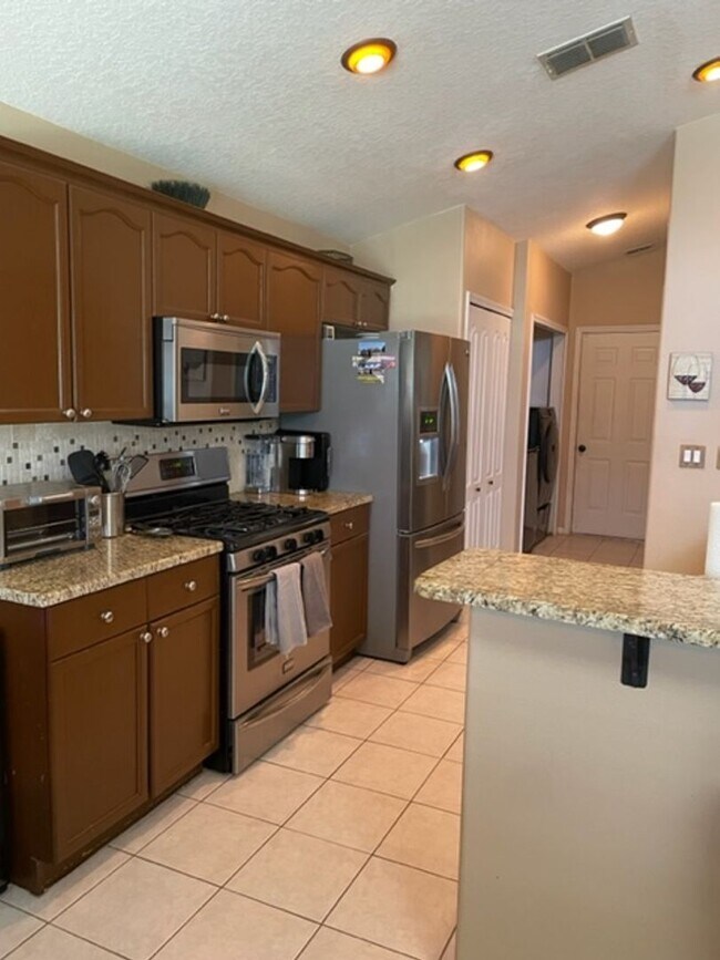 Photo - Lakefront 3-Bedroom Pool Home in Gated Com...