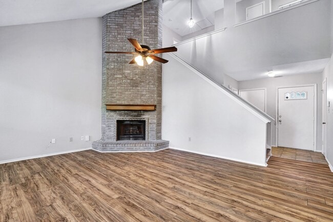 Photo - ***APPLICATION CURRENTLY UNDER REVIEW***Spacious Two-Story with Soaring Ceilings & No Carpet