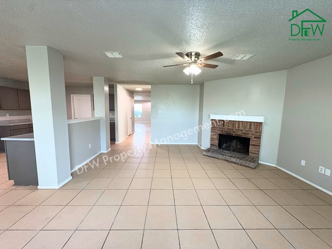 Photo - Spacious 4-Bedroom Home with Fireplace & Large Backyard in SW Fort Worth