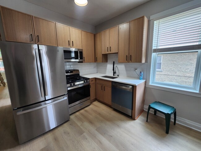 Building Photo - 5453 W Giddings St Unit 1