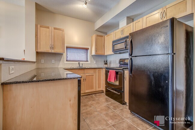 Photo - 5720-212 2 St SW