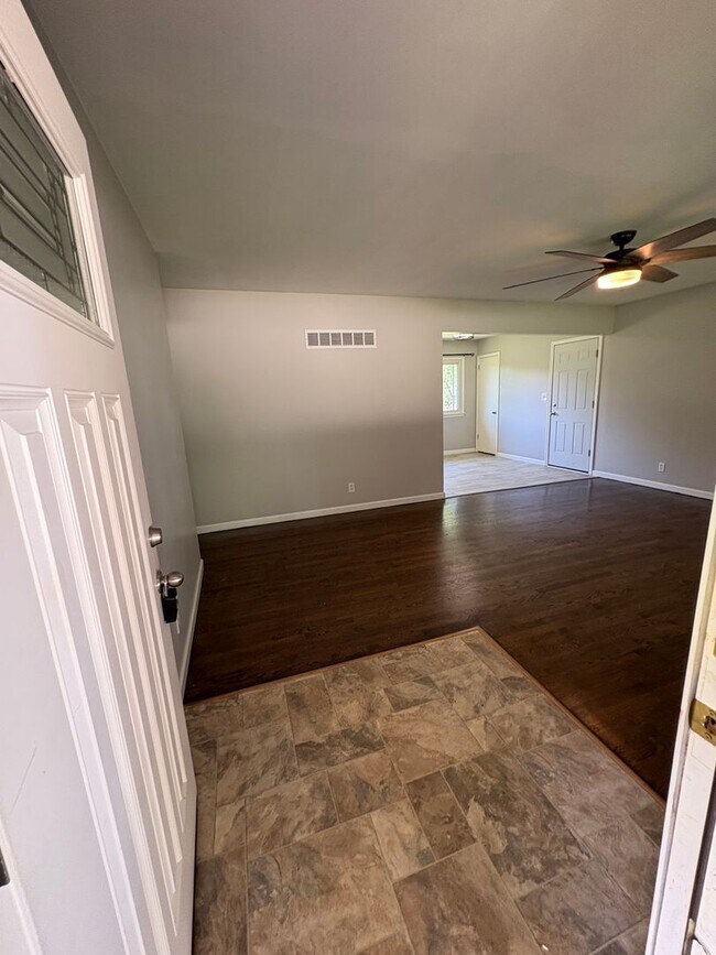 Photo - Spacious 4 Bed / 2.5 Bath Home on Nearly 3/4 Acre Lot with Walkout Basement and Multiple Living A...