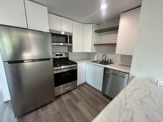 Photo - Chic, Sunlit & Move-In Ready – $500 off 1s...