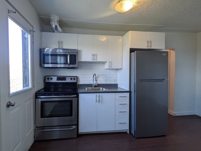 Photo - 1-Bedroom Unit With Private Balcony, Fireplace and Park View Unit 16