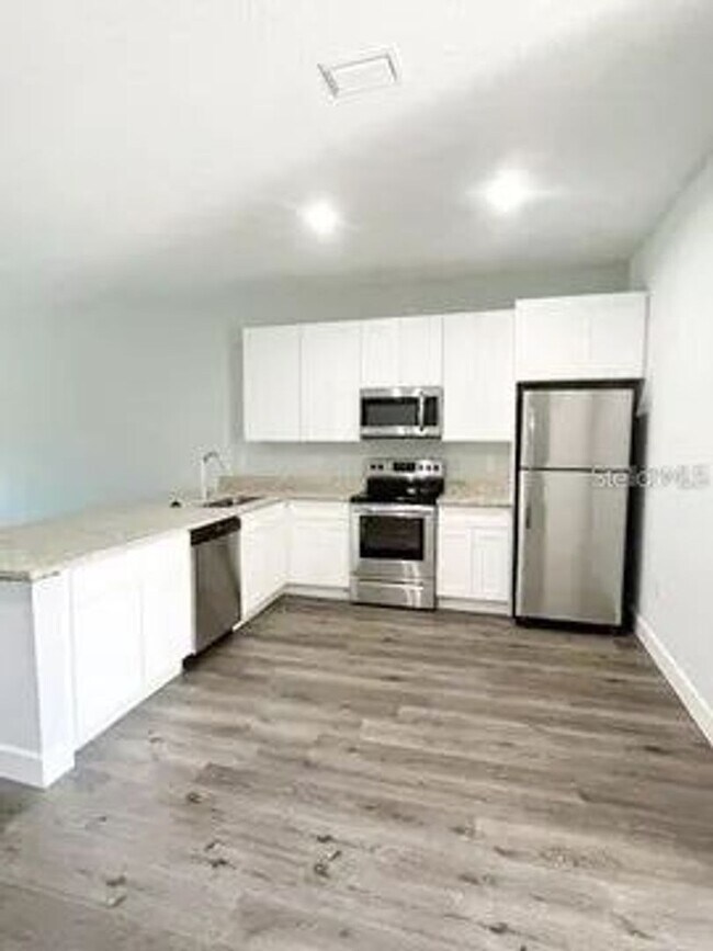 Photo - 13257 Blytheville Ave Unit 13259