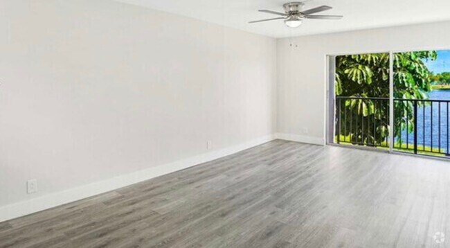 Building Photo - 8720 N Sherman Cir Unit 203 Rental