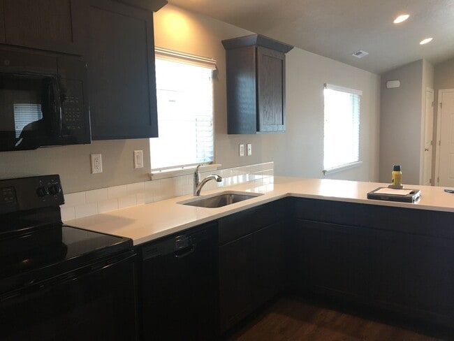 Photo - Cozy 2BR Home with Covered Patio & Animal-Friendly Yard – Utilities Included!