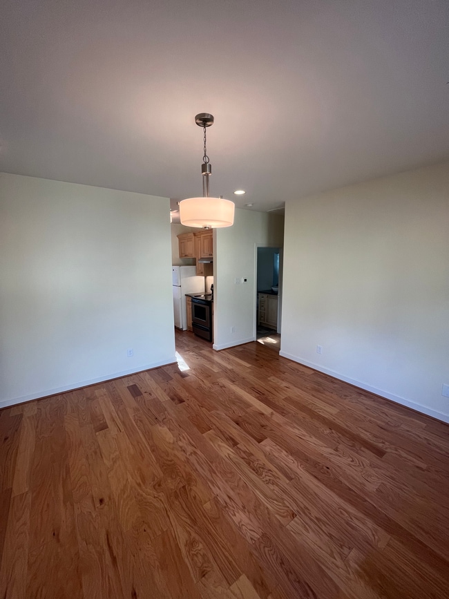 Spacious living room next to kitchen - 4388 Varsity Ln Unit A