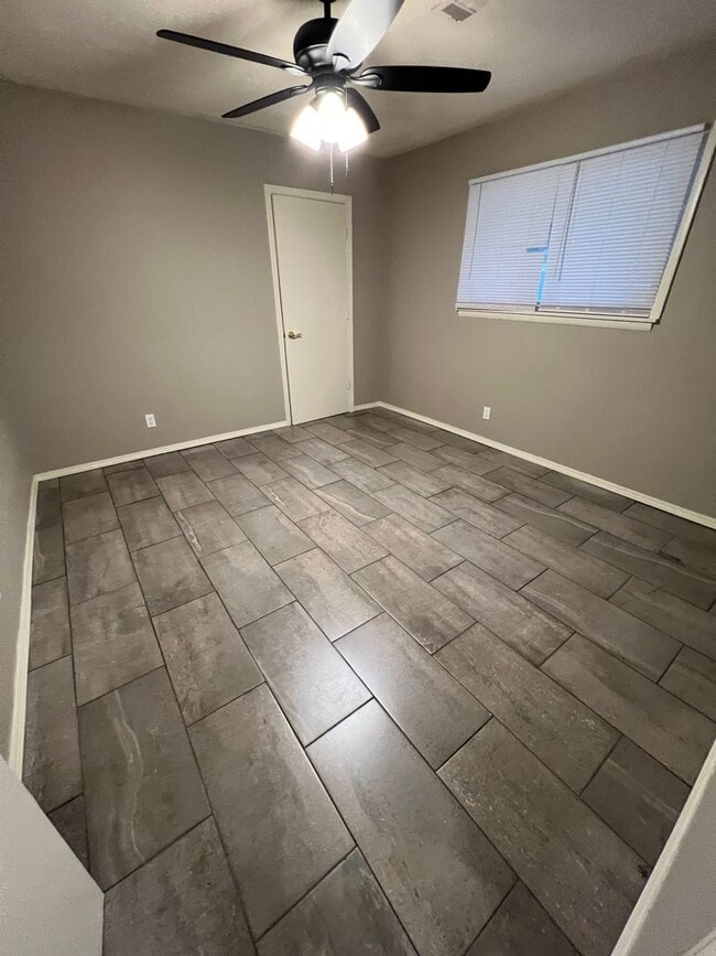 Photo - 2 Bed 1.5 Bath House with extra room that could be used as a extra Bed Room.  Yard Care Included....