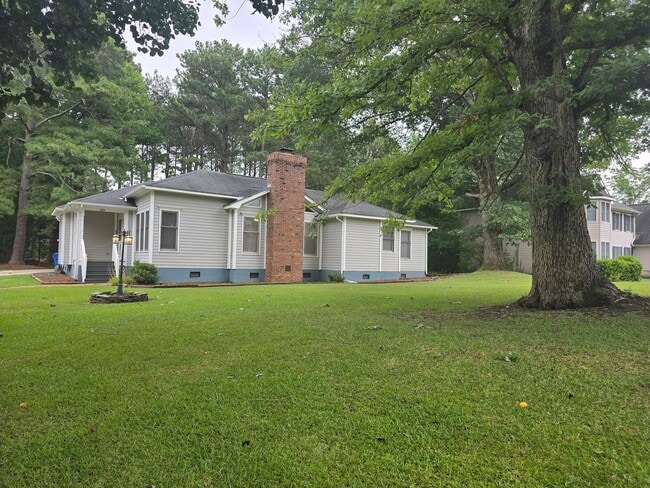 Photo - Quiet Neighborhood- Large Lot- Shed- Enclosed Sunroom! Community Pool & Tennis Courts!