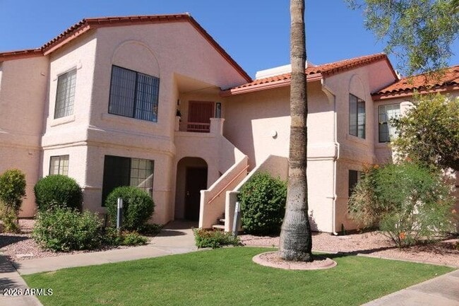 Building Photo - 9750 N 94th Pl Unit 208