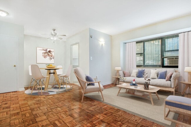 Studio apartment living and dining area (virtually staged)