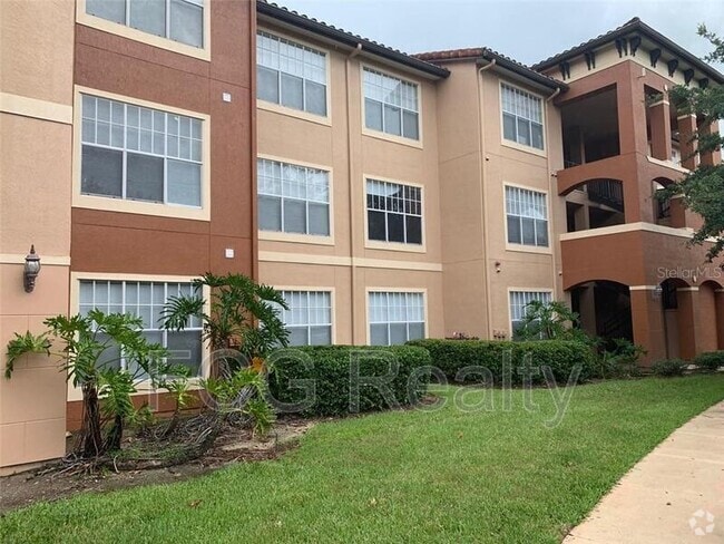 Building Photo - 5530 Metrowest Blvd Unit Apt 304
