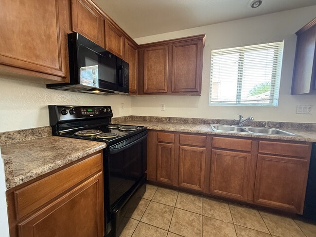 Photo - "Spacious 4-Bedroom Haven with 2 Bath Retreats in Laveen's Heart – 1,893 Sq Ft of Comfort!"
