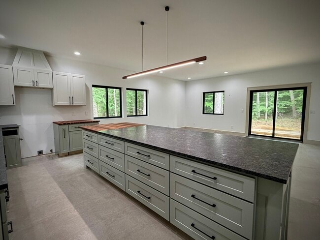 Leathered granite countertops. - 10673 US 31