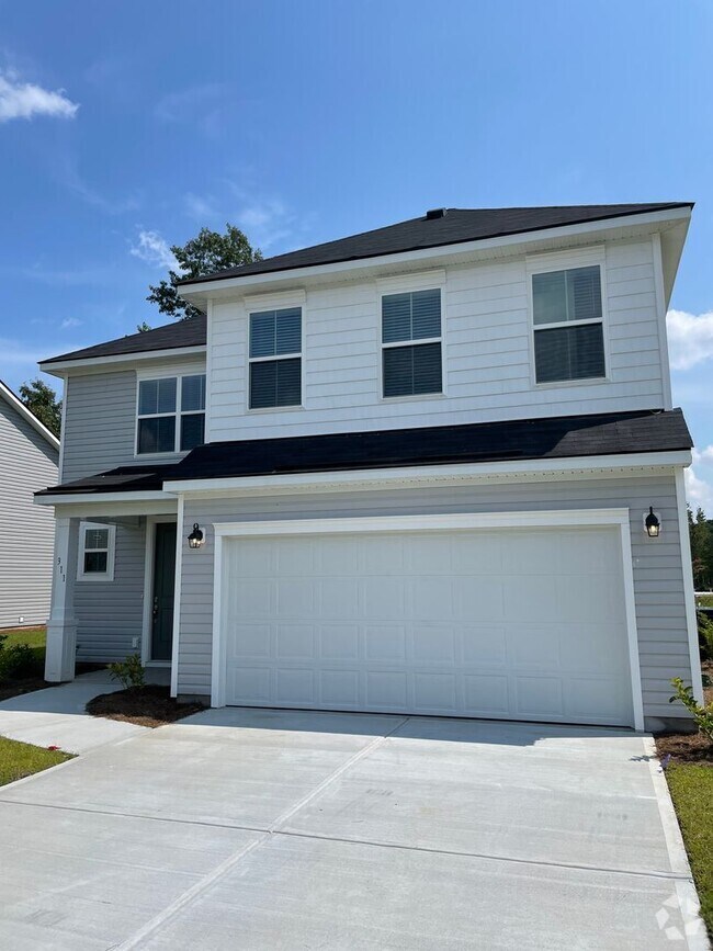 Building Photo - THE COMMONS AT RICHMOND HILL **Rent Specia... Rental