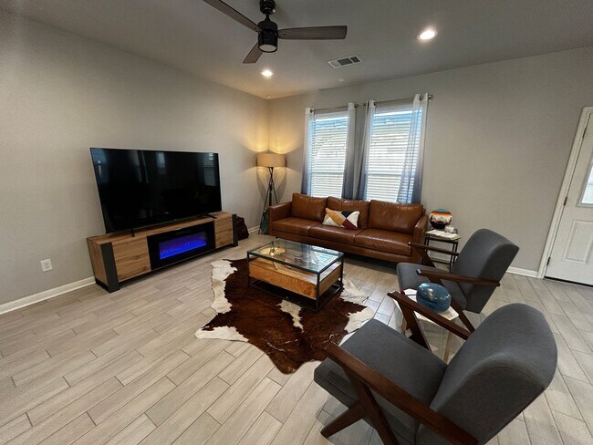 Photo - 3BR/2BA single-family home with fenced yard and attached garage in Jarrell, TX.