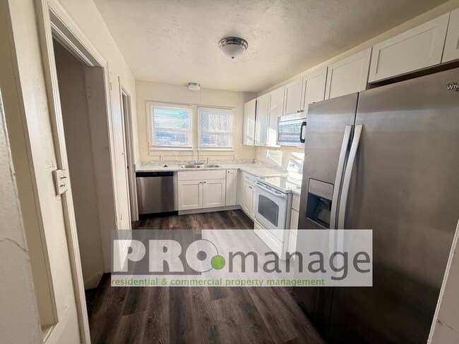 Photo - Single family home with yard