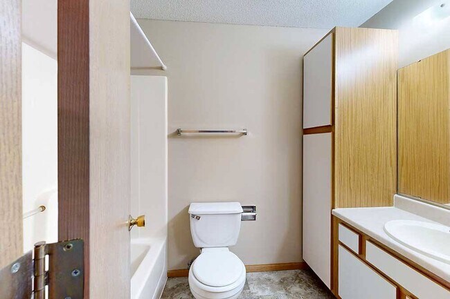 Well-designed bathrooms with added cabinet storage keep daily routines organized and essentials neatly tucked away.