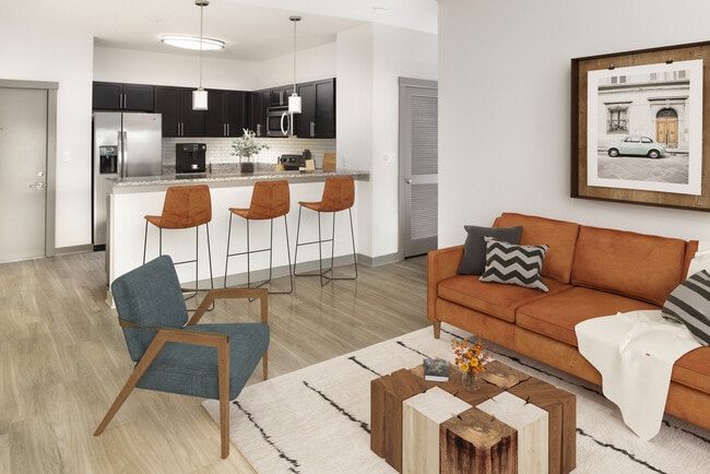 Renovated Package II Kitchen, living and dining area with hard surface flooring throughout and pendant lighting