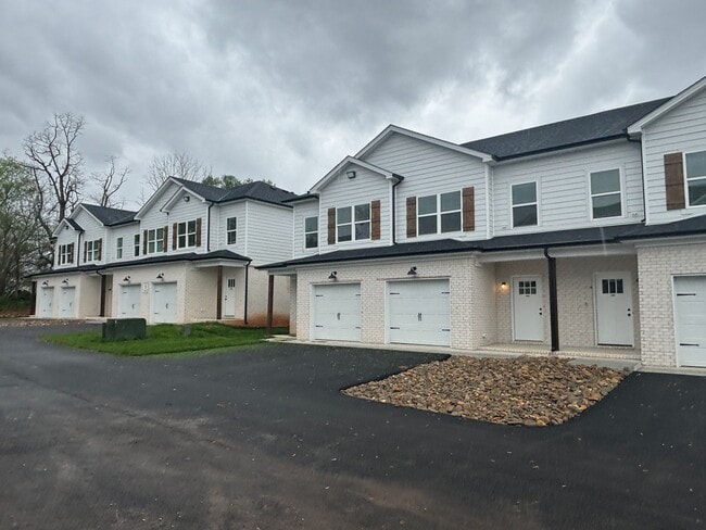 Photo - 2 Bed/2.5 Bath Townhome with Garage (Water/Sewer/Trash Included)