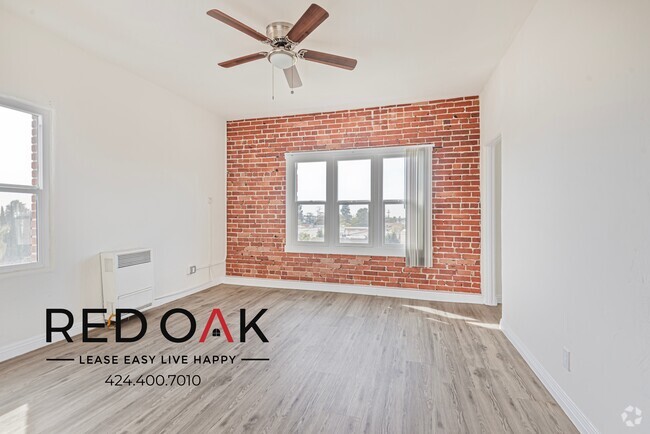 Building Photo - Studio with Exposed Brick Accent Wall, Lot... Unit 415 Rental