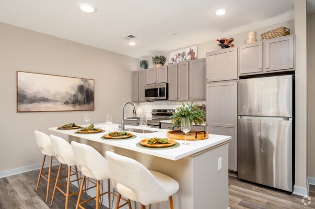 Modern Kitchen w/ Stainless Steel Appliances - The Grove