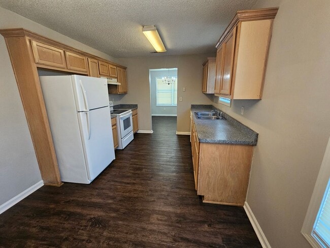 Photo - Renovated 3BR 2BA Home w/ 2-Car Garage • Open-View Kitchen • Garage • Garden Tub in Griffin