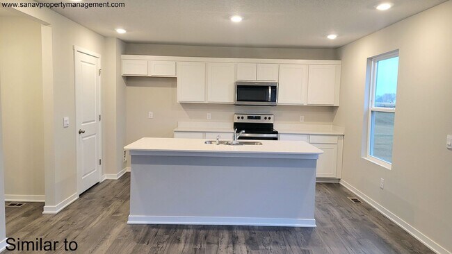 Photo - Contemporary Comfort: A Four-Bedroom Haven with Modern Flourish w/ 3 CAR GARAGE and a Fenced Back...
