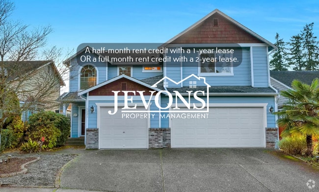 Building Photo - Spacious 4-bedroom home with fully equippe...