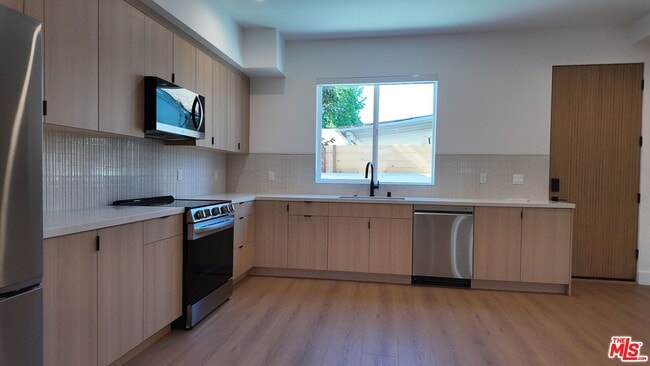 Photo - 5248 Auckland Ave Unit 3/4