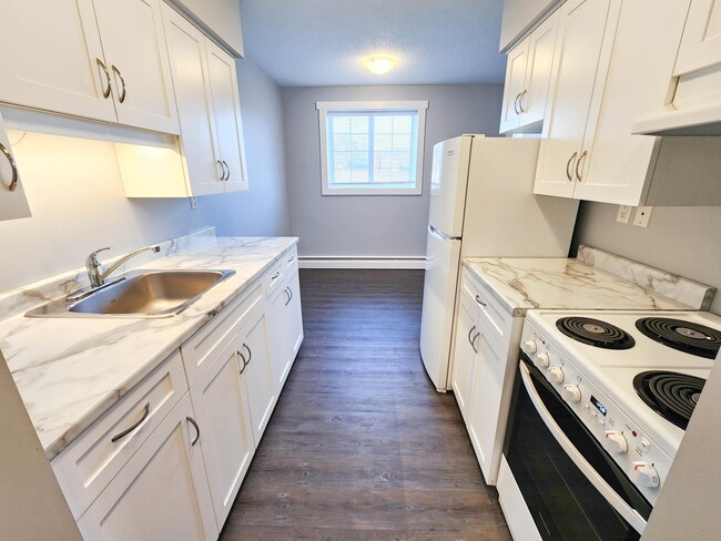 Building Photo - 4621 Veterans Way Unit 14 - FURNISHED