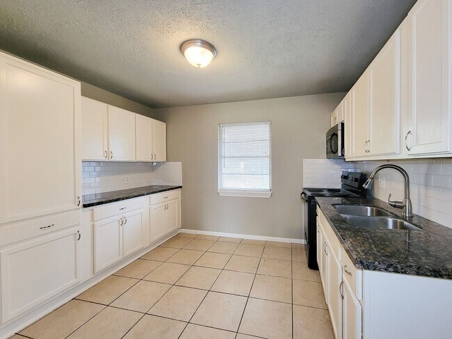 Photo - Nice 3 bedroom home that is conveniently situated near local stores and easy access to us 288. Th...