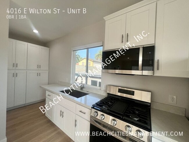 Building Photo - 4016 E Wilton St Unit B
