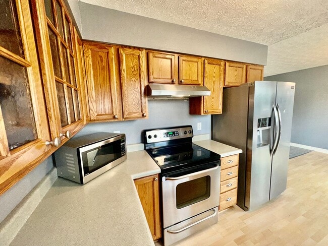 Photo - HUGE BACKYARD, 4 BED 2 BATH, HEATED GARAGE HOME!