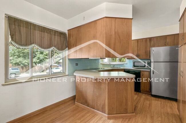 Photo - Charming Home with Convenient Location and Two Car Garage!