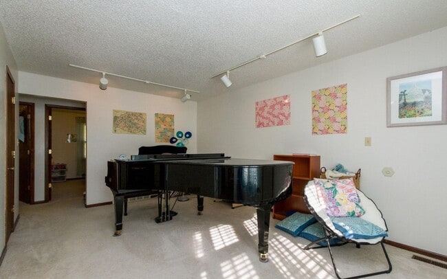 Photo - Clean three bedroom one bath duplex with walk out basement looking at trees, across from park
