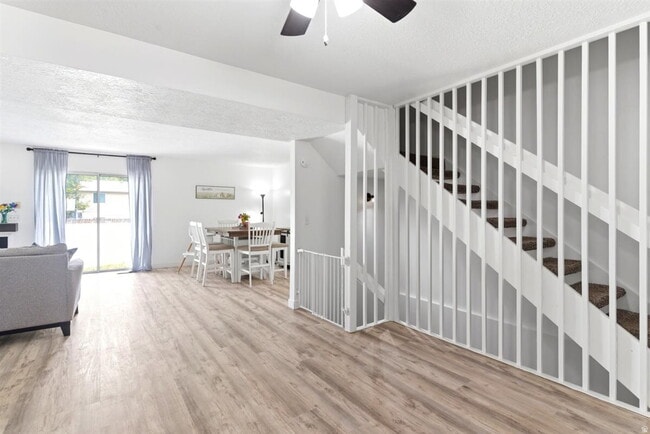 Photo - "Spacious 3-Bed Oasis with Fireplace & Modern Vinyl Touches in Ogden"