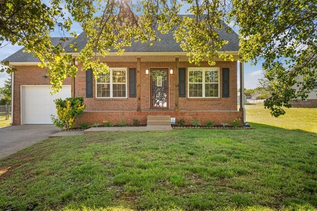 Building Photo - Charming Brick Home with Soaring Ceilings & Updated Finishes!