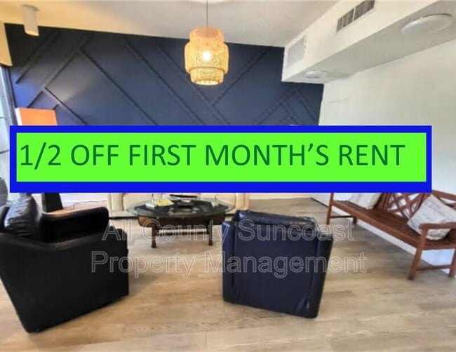 Building Photo - 7400 Sun Island Dr S Unit 205