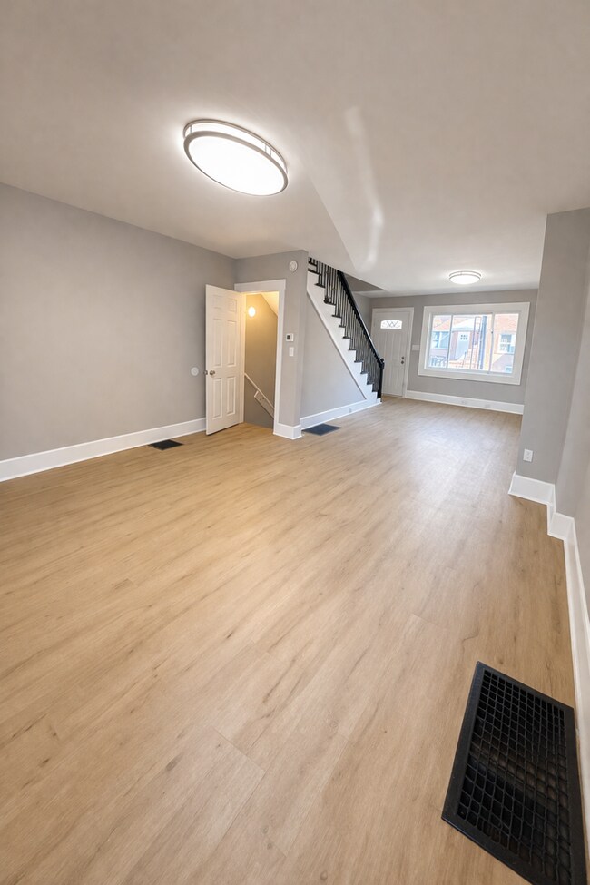 Photo - Beautifully Modern 3BR Townhome | Finished Basement | Fenced Yard | Baltimore