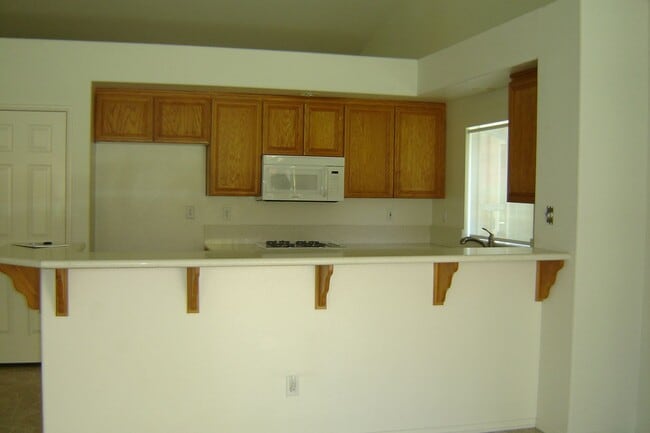 Photo - Spacious single-level home located on a quiet corner lot in a well-established Oceanside neighbor...