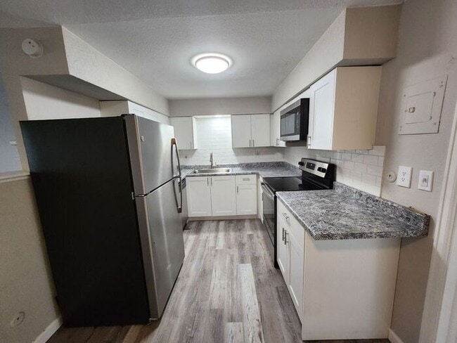 Photo - 2-Bedroom Townhome with Fenced Backyard and Modern Updates! |Utilities Included!