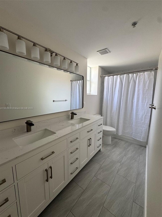 Building Photo - 6420 NW 114th Ave Unit 1328 Rental