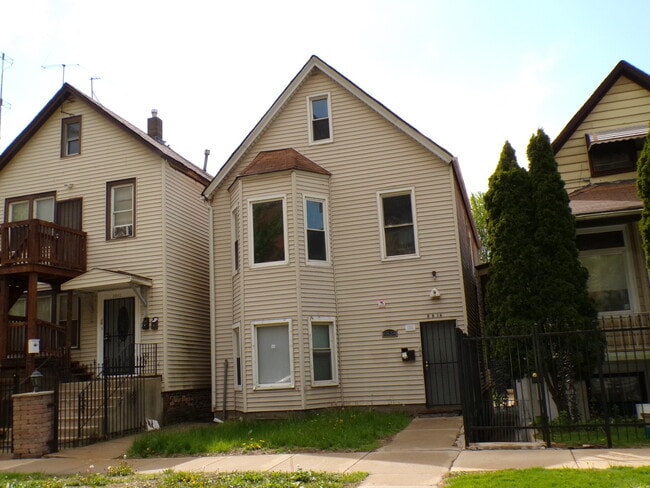 Building Photo - 8838 S Marquette Ave Unit 2