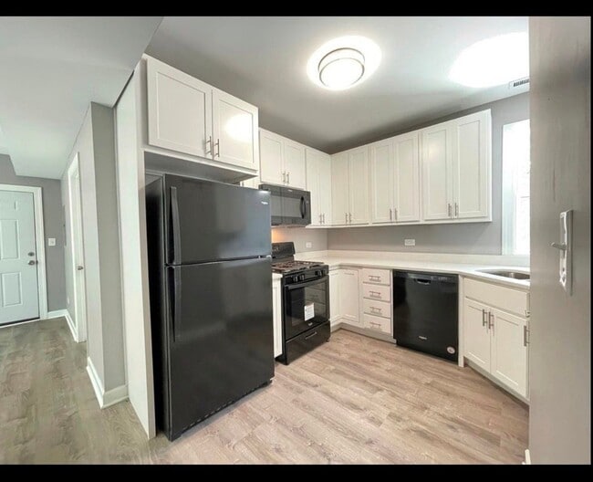 Building Photo - 5607 S Throop St Unit 4