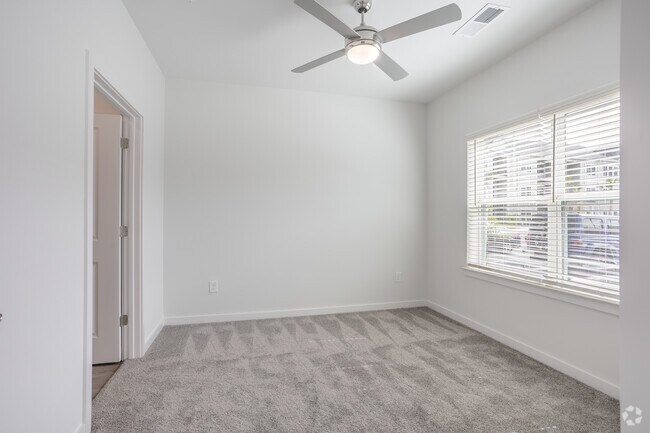 1BR, 1BA - 774SF - Primary Bedroom - Emblem Cane Bay North