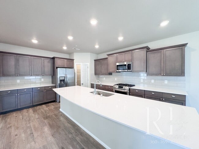 Photo - Luxury 4-Bedroom Home with Loft, 10' Ceilings, Gourmet Kitchen & Premium Upgrades