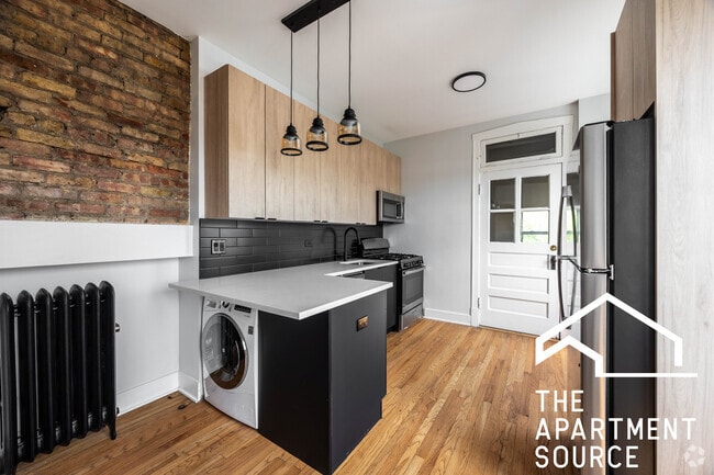 Building Photo - 4011 N Lowell Ave Unit 3W Rental